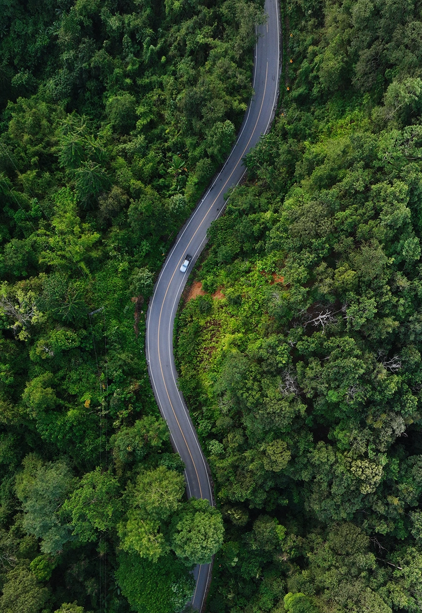 Aerial View Of Car Driving On Highway